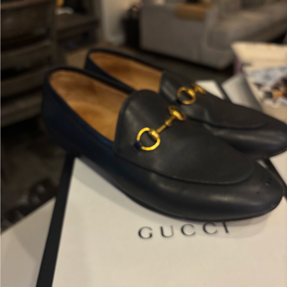 Gucci Black Leather Loafers with Gold Accents